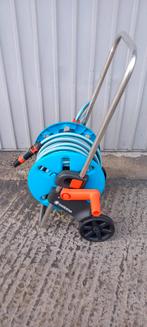 Tuinslang op mobiele haspel, Jardin & Terrasse, Tuyaux d'arrosage, Enlèvement, Comme neuf, Tuyau d'arrosage