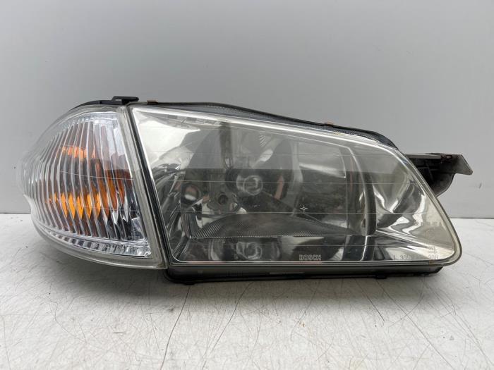 Koplamp rechts van een Mazda 323F, Auto-onderdelen, Verlichting, Mazda, Gebruikt, 3 maanden garantie, Ophalen of Verzenden