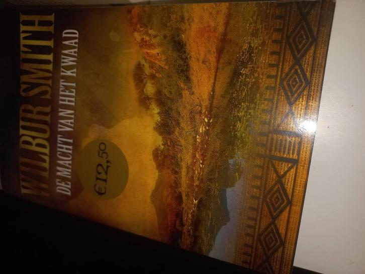 Wilbur Smith - De macht van het kwaad, Boeken, Thrillers, Zo goed als nieuw, Ophalen of Verzenden