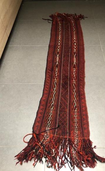 Tapis oriental ancien disponible aux enchères