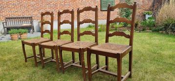 Vier rieten stoelen beschikbaar voor biedingen