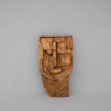 Gold sculptured head beschikbaar voor biedingen