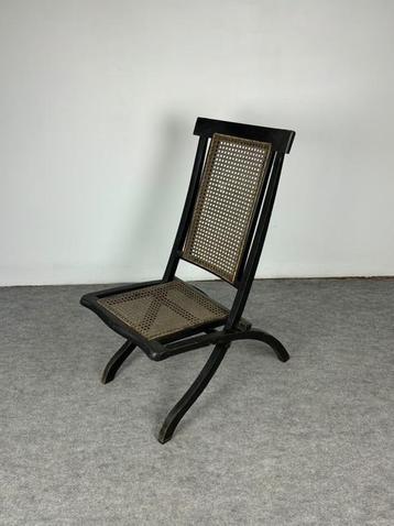 Chaise pliante vintage  disponible aux enchères