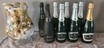 8 flessen Cava, Ophalen