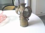 carbuurlamp fietslamp, Ophalen