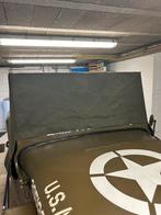 Bâche de stockage pour jeep, Ophalen