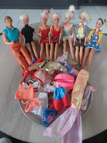 Barbiepoppen en Ken met extra kleedjes beschikbaar voor biedingen