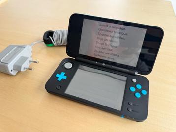 Nintendo 2DS XL + lader  beschikbaar voor biedingen