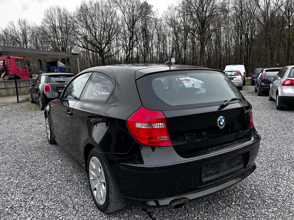 Bmw 116I 1.6 benzine km80.000 bj 2009, Auto's, BMW, Voorwielaandrijving, Zwart, 4 cilinders, 1600 cc