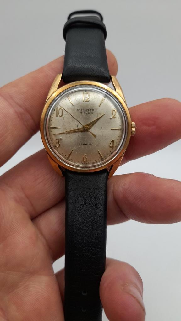 Vintage Mildia Swiss heren horloge verguld, Handtassen en Accessoires, Horloges | Heren, Gebruikt, Polshorloge, Staal, Leer, Ophalen of Verzenden