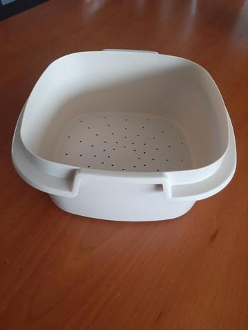 Vergiet van tupperware.  beschikbaar voor biedingen