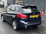 BMW 2-serie Active Tourer 218i High Executive, navigatie, ca, Auto's, BMW, Monovolume, Gebruikt, Euro 6, Blauw