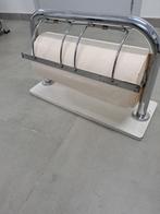 papierrolhouder, Ophalen