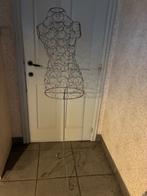 Metalen paspop, Ophalen