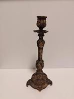 Bronzen kaarshouder, Ophalen