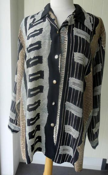 Zeer chique blouse maat 50 beschikbaar voor biedingen