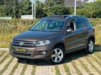 Vw Tiguan 1.4 TSI Piano 12 maanden garantie, Auto's, Voorwielaandrijving, Euro 5, Stof, Zwart