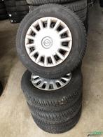 Opel Corsa en Astra winterbandenset 4 x 100 ET38 - 185-70-14, Auto-onderdelen, 14 inch, Gebruikt, Banden en Velgen, Personenwagen