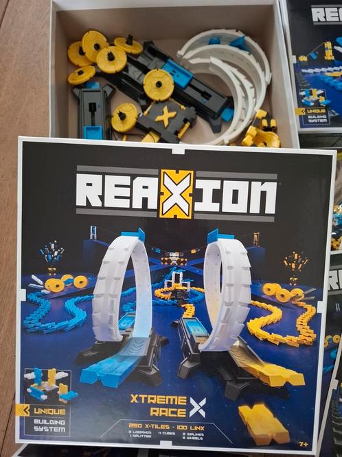 Reaxion Extreme Domino (4 dozen), Kinderen en Baby's, Speelgoed | Bouwstenen, Zo goed als nieuw, Ophalen of Verzenden
