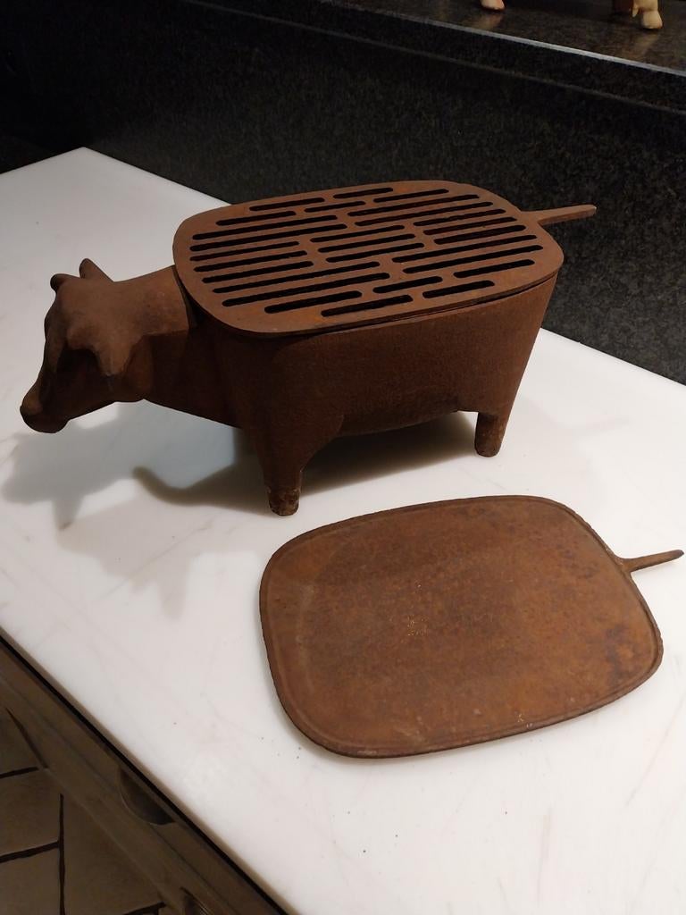 Gietijzeren bbq in de vorm van een koe, Ophalen
