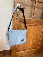 Een lichtblauwe schoudertas van Eastpak, Ophalen of Verzenden, Gebruikt, Blauw, Overige merken