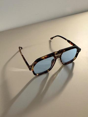 Azure Frame II - Blauwgetinte Zonnebril met Gevlekt Design beschikbaar voor biedingen