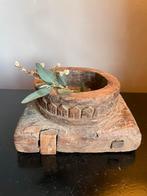 Oude houten vijzel, Ophalen