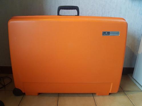 Delsey harde kunststof valies oranje, Handtassen en Accessoires, Koffers, Gebruikt, Hard kunststof, 70 cm of meer, 45 tot 55 cm