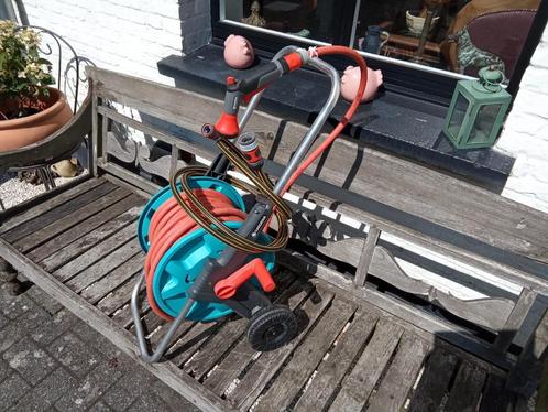 Tuinslang/Haspel merk Gardena met + - 30 meter tuinslang., Tuin en Terras, Tuinslangen, Zo goed als nieuw, Tuinslanghaspel, Ophalen