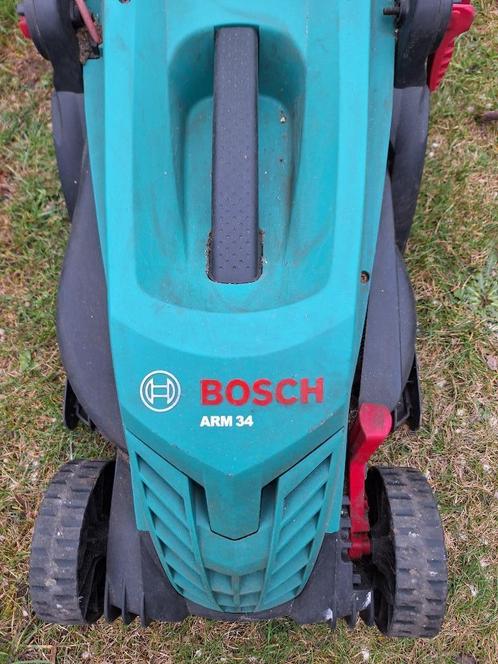 elektrische grasmaaier  Bosch ARM 34, Tuin en Terras, Grasmaaiers, Zo goed als nieuw, Elektrische grasmaaier, 30 t/m 39 cm, Cirkelmaaier