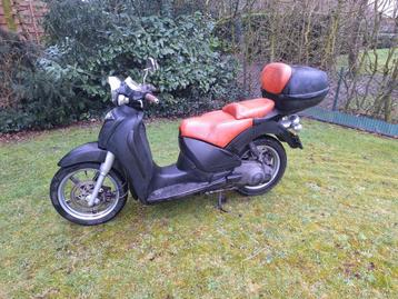 Trottinette Aprillia Scarabeo 125cc 