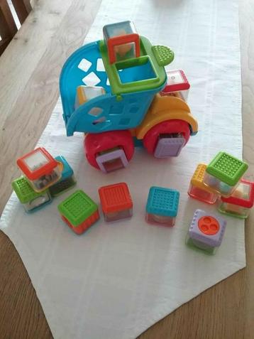 CAMION BENNE musical avec blocs d'éveils.  beschikbaar voor biedingen