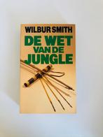 Wilbur Smith - De wet van de jungle, Livres, Thrillers, Comme neuf, Enlèvement ou Envoi