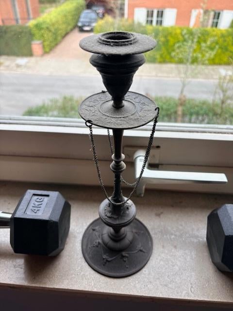 kandelaar met stempel, Ophalen