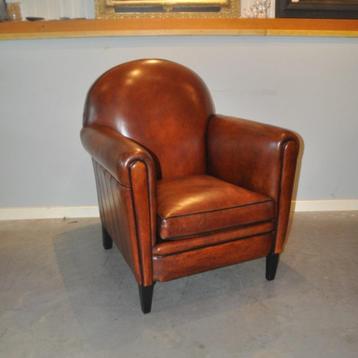 Mike, set schapenleren fauteuils i.z.g.s. beschikbaar voor biedingen