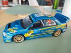 Subaru Impreza WRC 2004 rally Catalunya 1/18, Hobby en Vrije tijd, Ophalen of Verzenden, Zo goed als nieuw