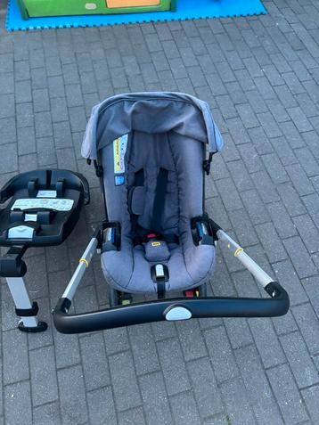 Doona+ autostoel en isofix met originele regenhoes beschikbaar voor biedingen
