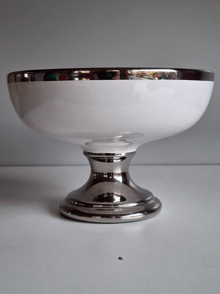 Ronde sier schaal op voet  J-Line, Enlèvement