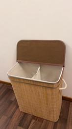 Nieuwe wasmand, Ophalen