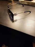 2 zonnenbrillen, Ophalen