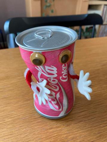 Dansend Coca Cola Blikje beschikbaar voor biedingen