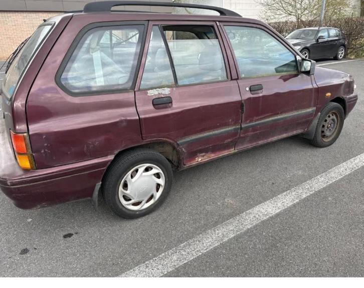 Kia pride 1.3 benzine 28.645km bouwjaar 1999 export, Auto's, Kia, Bedrijf, Te koop, Pride, ABS, Airbags, Metaalkleur, Radio, Verwarmde buitenspiegels