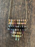 Lange vintage ketting met fantasiehanger, Kunststof, Bruin, Ophalen of Verzenden, Verstelbaar