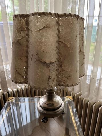 Antieke lamp kap in varkensblaas, Enlèvement