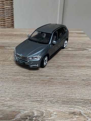 BMW x5 serie schaal 1:24 beschikbaar voor biedingen