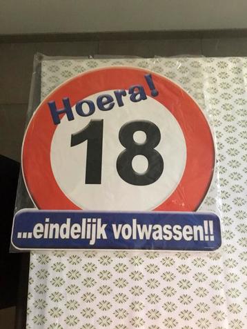 Groot huldeschild: 18 jaar