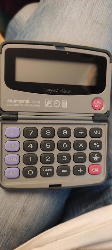 Calculatrice électronique de poche aurora SP70 Compact Alarm disponible aux enchères