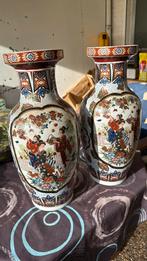 2 vazen in chinese stijl, Ophalen
