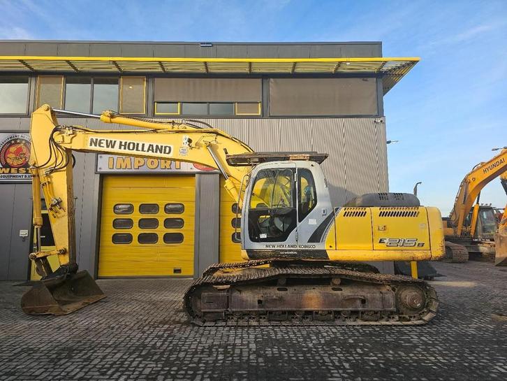 New Holland E215B WE1548, Zakelijke goederen, Machines en Bouw | Kranen en Graafmachines, Graafmachine