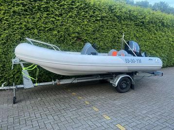 Zodiac 460 Rib 70 PK Suzuki Nieuw Gespoten kuip Mooie staat.